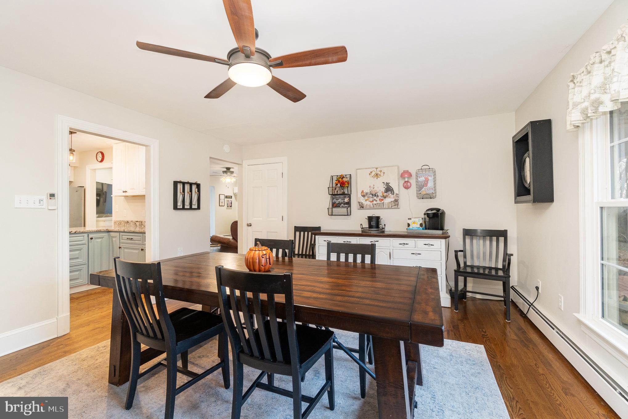 35 North Tannery Road Westminster, MD 21157 - Photo 13 of 47 a view of a dining room with furniture and wooden floor