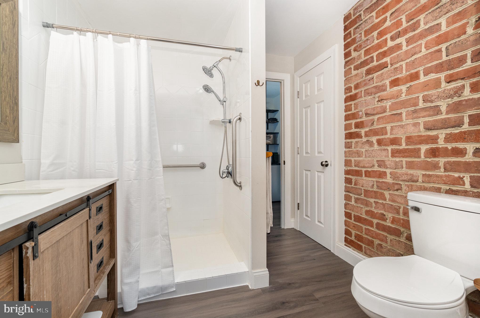 35 North Tannery Road Westminster, MD 21157 - Photo 18 of 47 a bathroom with a toilet a sink and shower