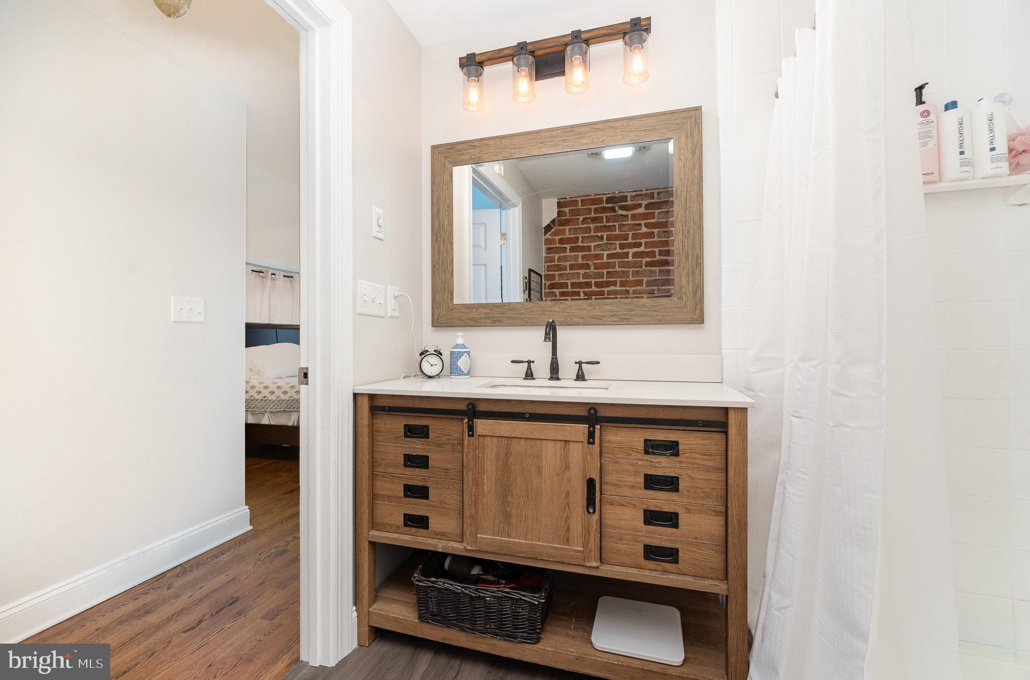 35 North Tannery Road Westminster, MD 21157 - Photo 19 of 47 a bathroom with a sink and a mirror