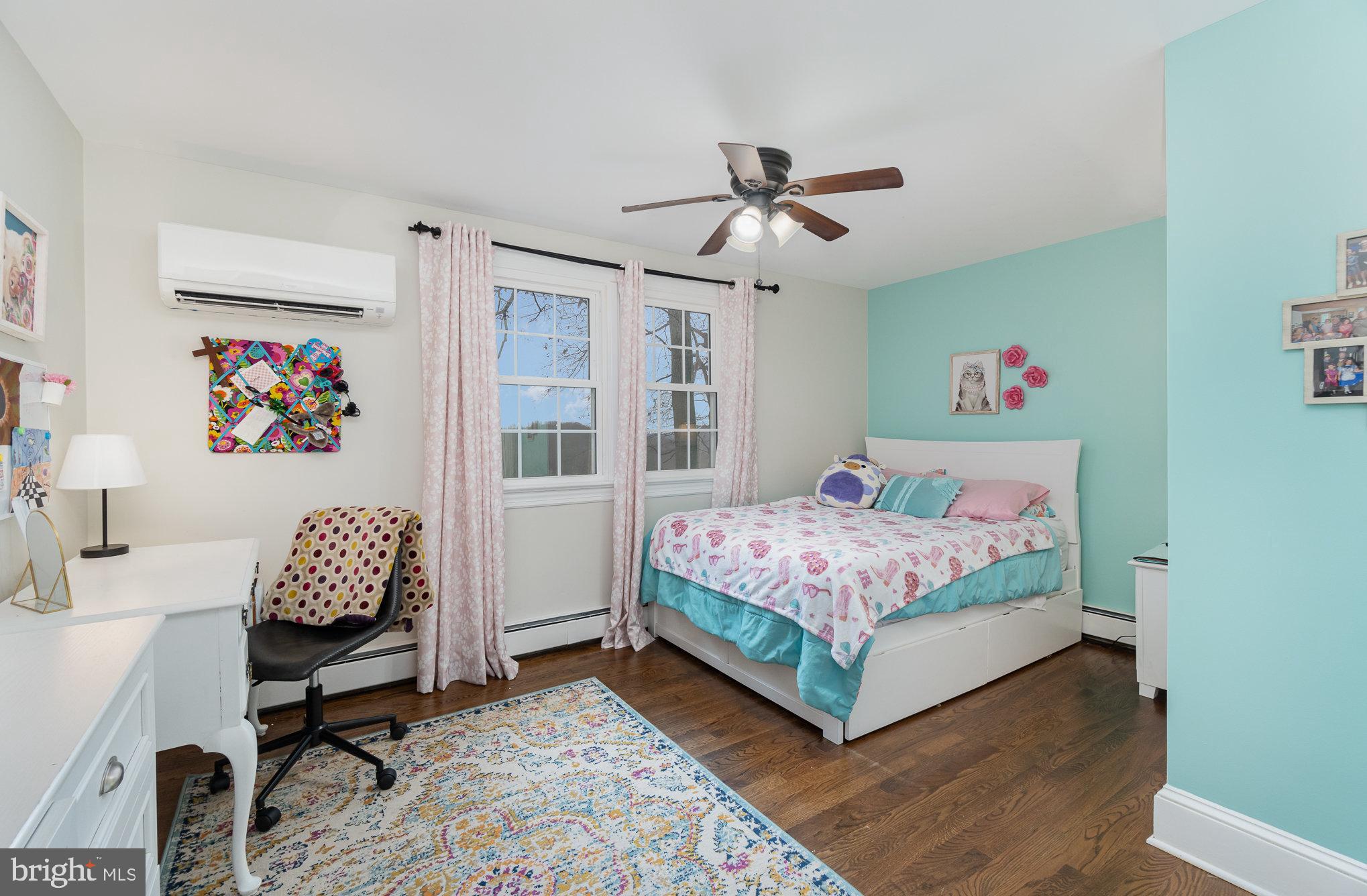 35 North Tannery Road Westminster, MD 21157 - Photo 20 of 47 a bedroom with a bed and a chandelier