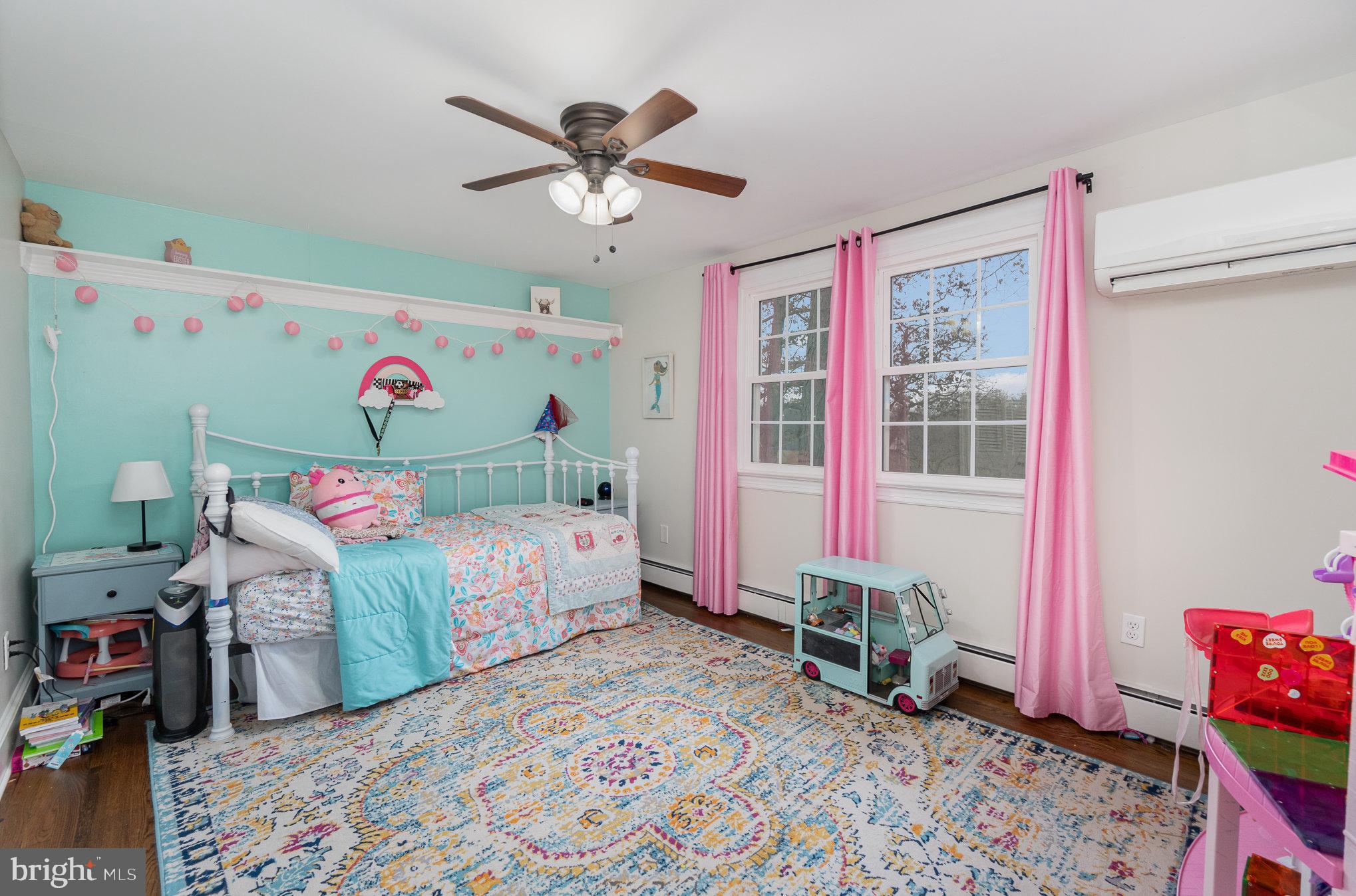 35 North Tannery Road Westminster, MD 21157 - Photo 22 of 47 a bedroom with a bed and a chandelier