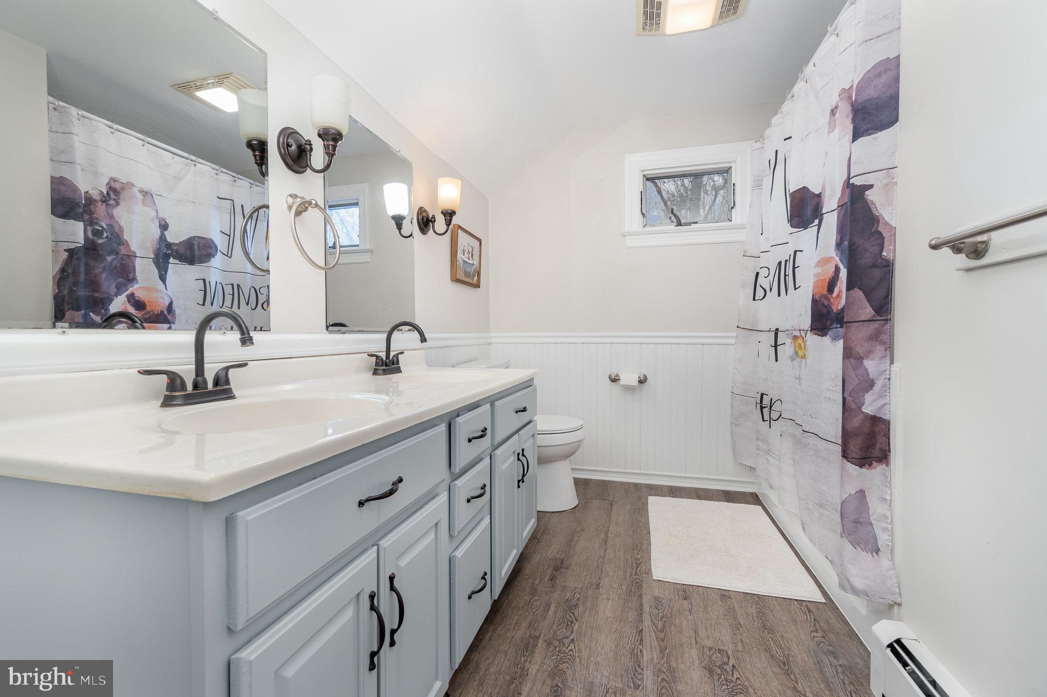 35 North Tannery Road Westminster, MD 21157 - Photo 24 of 47 a bathroom with double vanity sink a mirror a vanity and shower