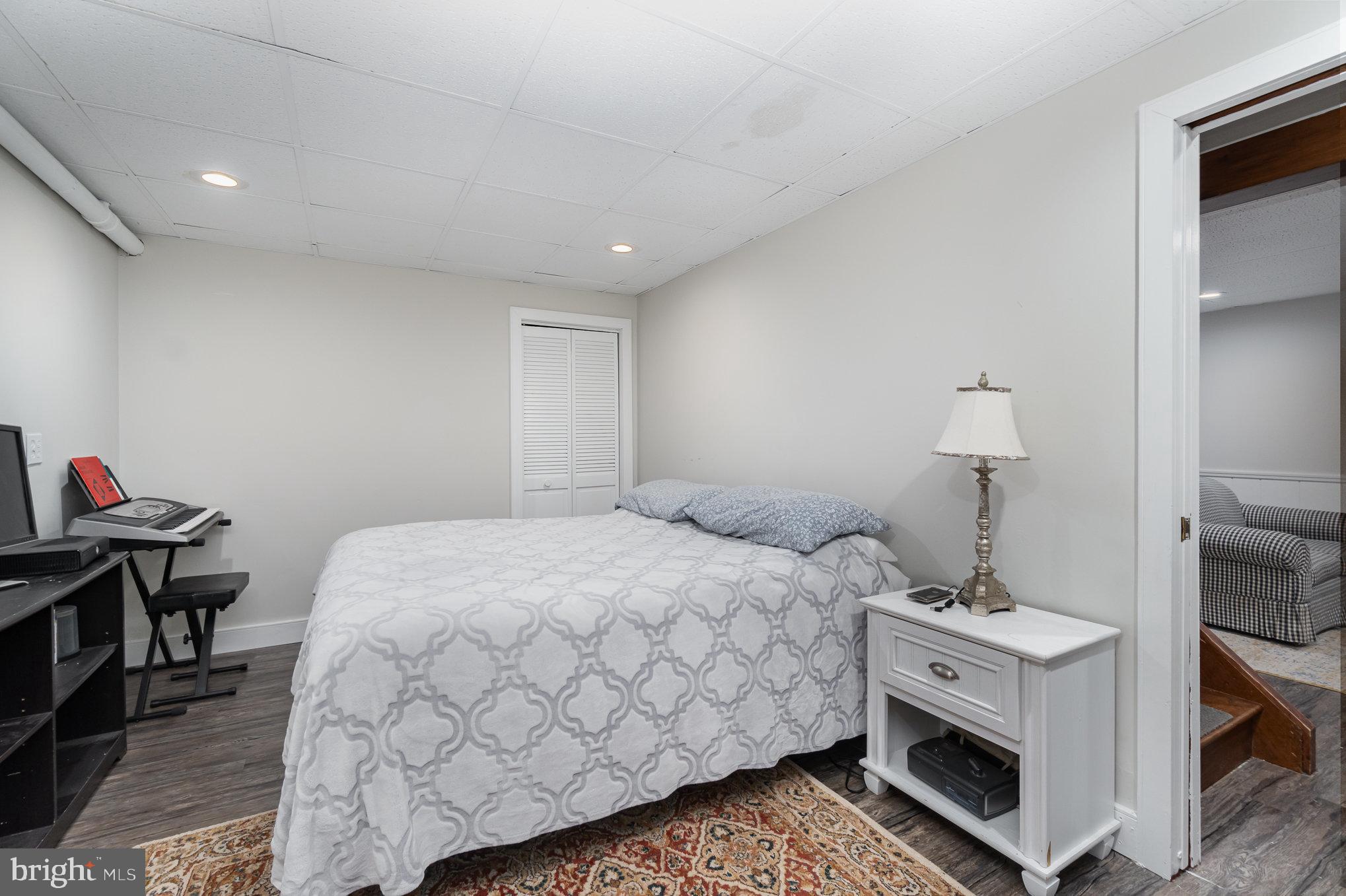 35 North Tannery Road Westminster, MD 21157 - Photo 27 of 47 a bedroom with a bed and a table in it