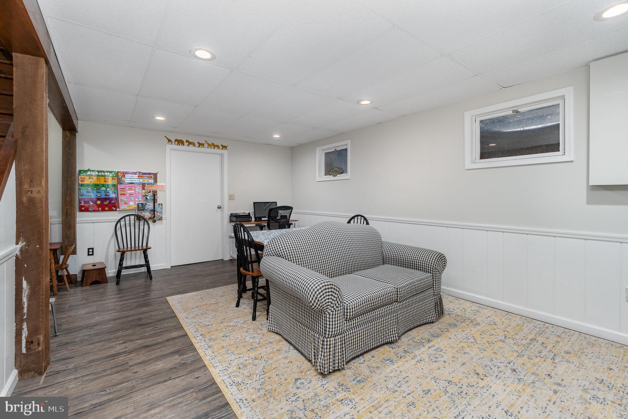 35 North Tannery Road Westminster, MD 21157 - Photo 29 of 47 a living room with furniture and wooden floor