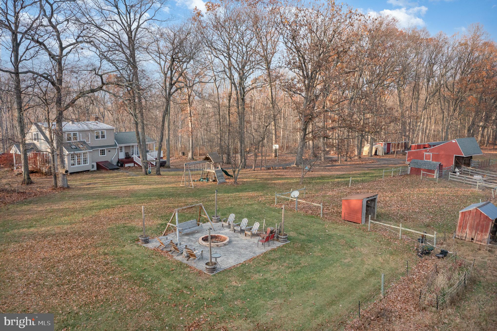 35 North Tannery Road Westminster, MD 21157 - Photo 35 of 47 a view of a fire pit with large trees