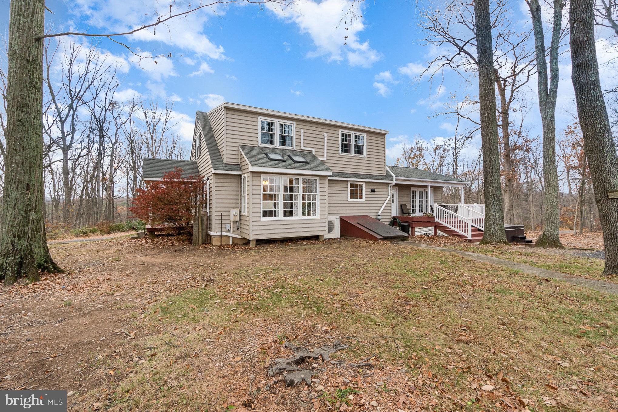 35 North Tannery Road Westminster, MD 21157 - Photo 4 of 47 a view of a house with a yard covered with snow and trees
