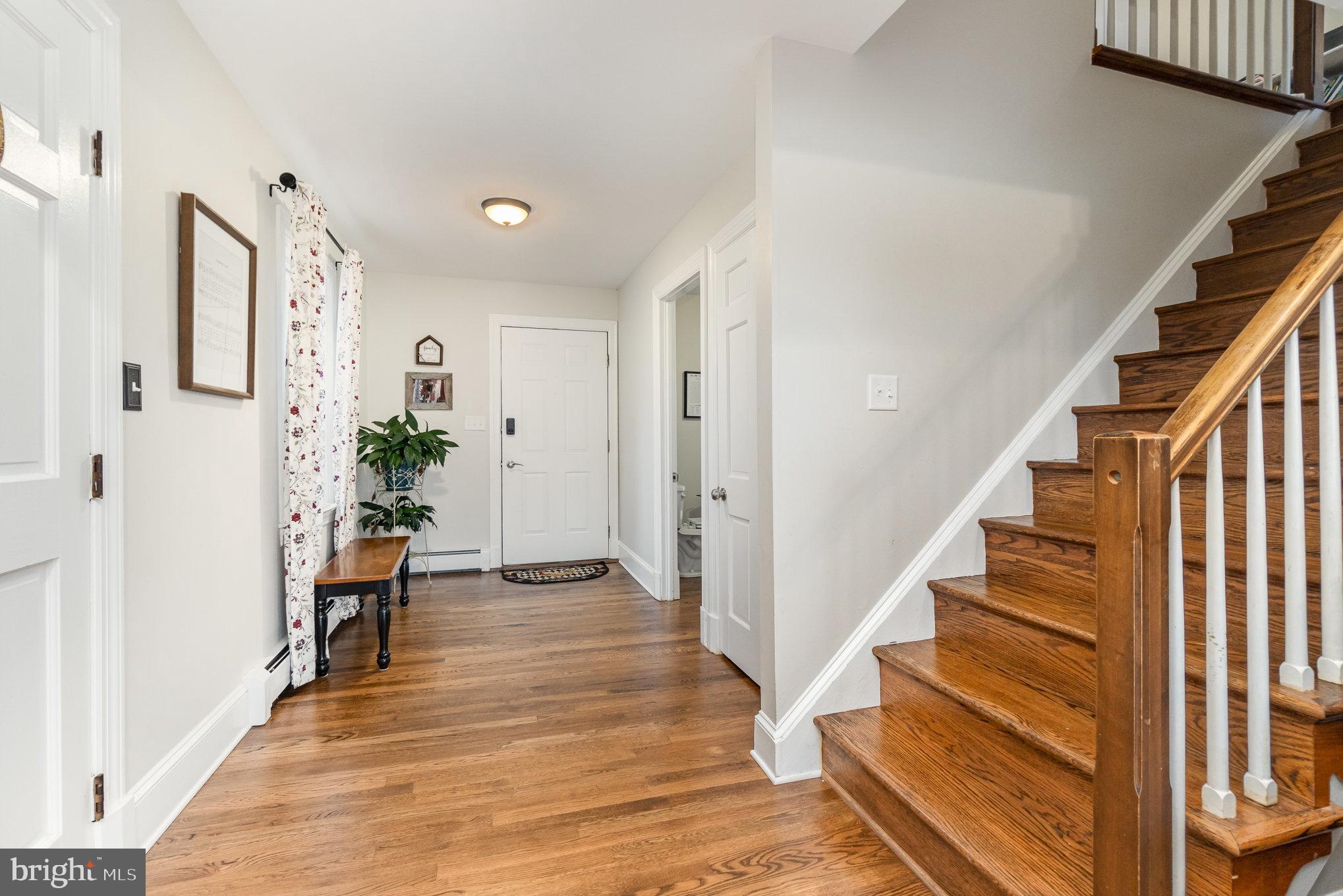35 North Tannery Road Westminster, MD 21157 - Photo 5 of 47 a view of entryway and hall with wooden floor