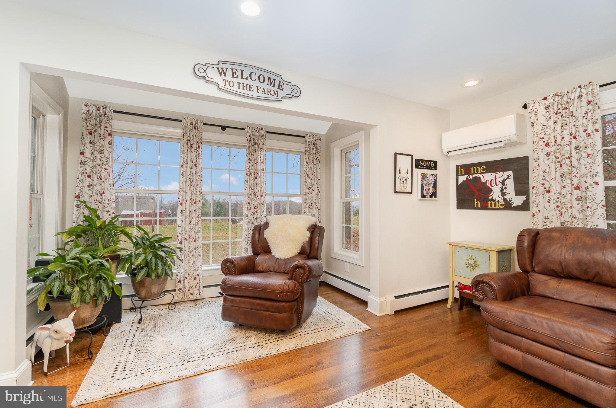 35 North Tannery Road Westminster, MD 21157 - Photo 10 of 47 a living room with furniture and a potted plant
