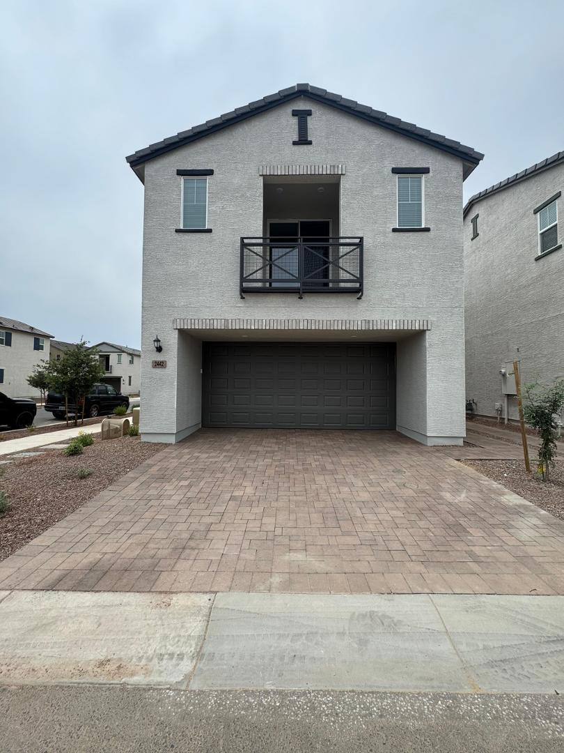 2442 West Maximo Way Phoenix, AZ 85085 - Photo 1 of 16 a front view of a house with yard