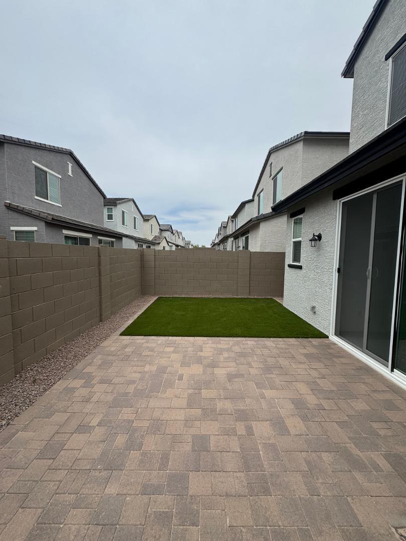 2442 West Maximo Way Phoenix, AZ 85085 - Photo 7 of 16 a view of a back yard of the house