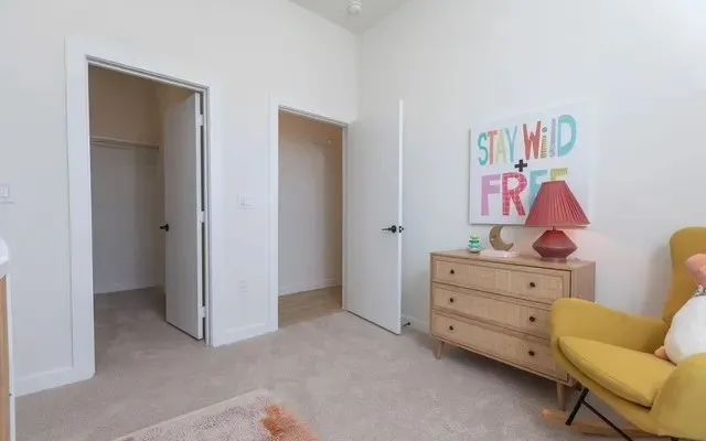 a room with chair and closet