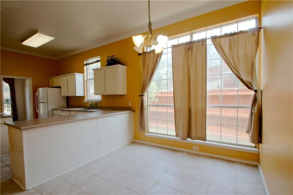 559 Raintree Circle Coppell, TX 75019 - Photo 5 of 18 a living room with a window
