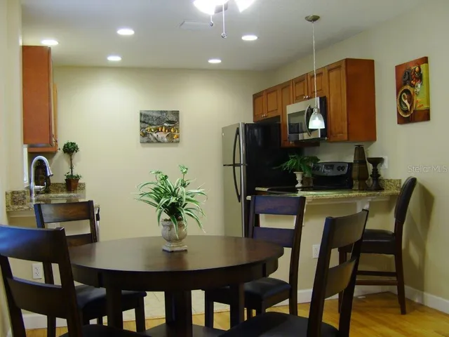 a view of a dining room with furniture