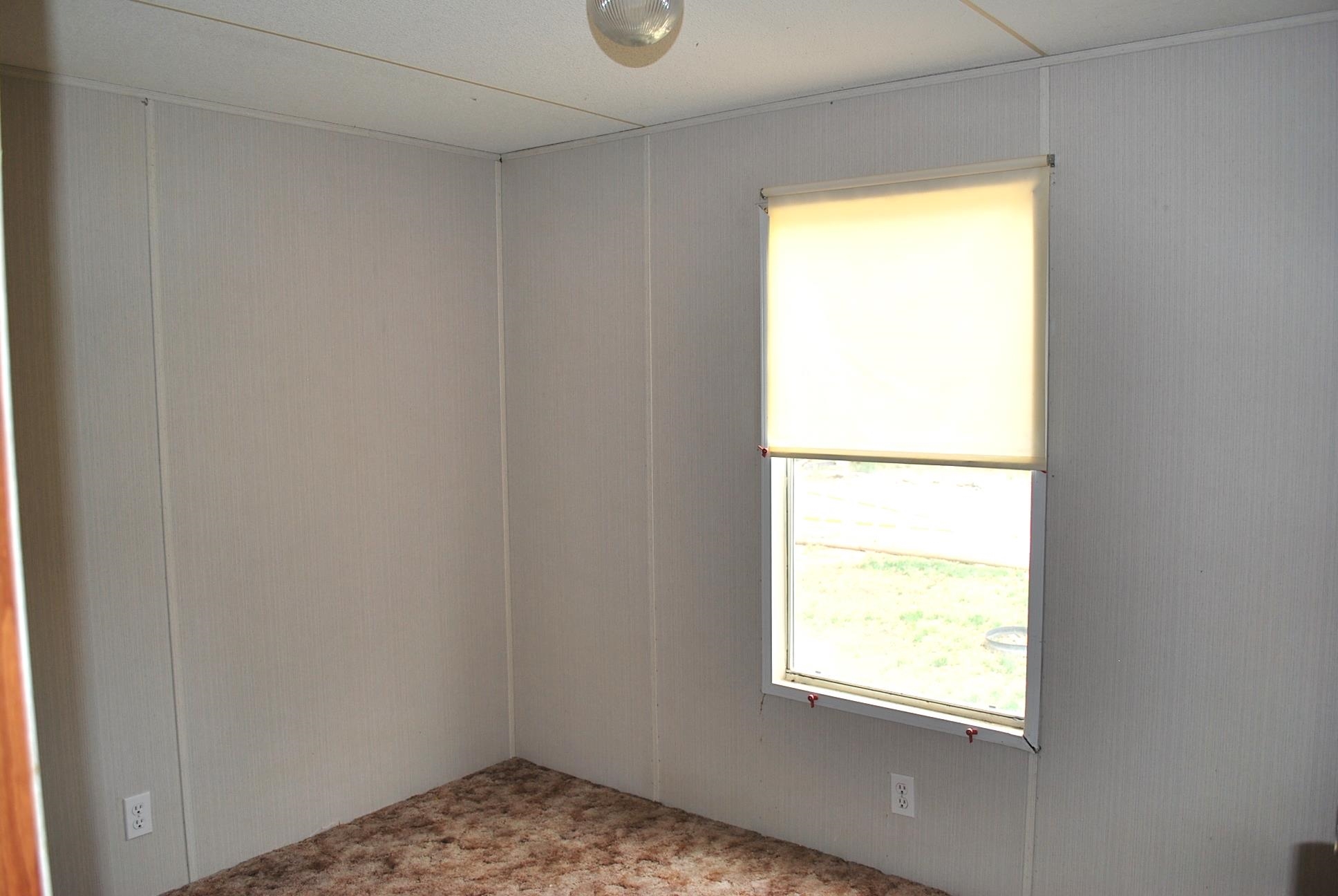 424 32 Road, Unit 168 Clifton, CO 81520 - Photo 12 of 17 a view of an empty room and a window