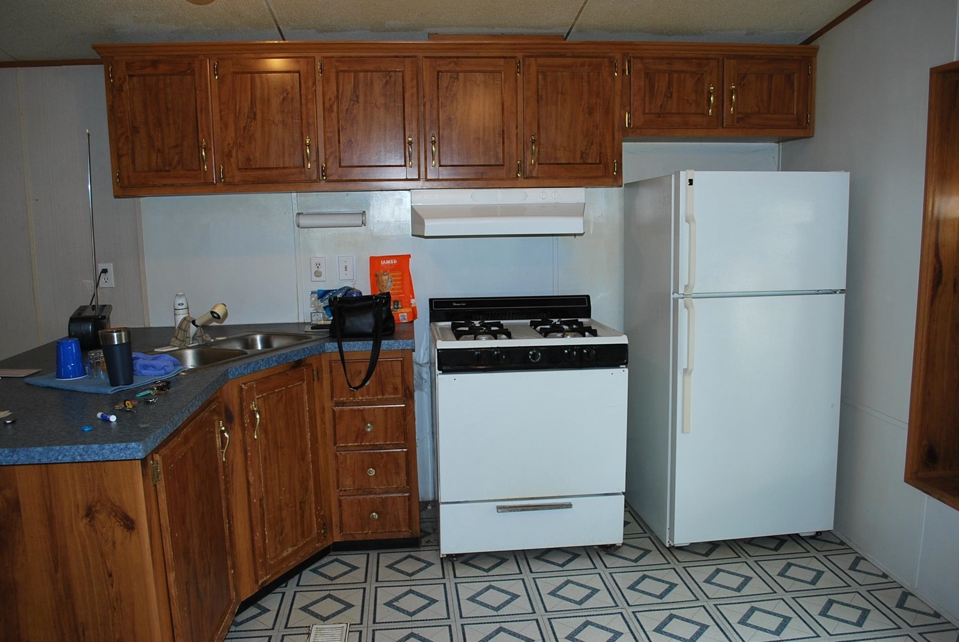 424 32 Road, Unit 168 Clifton, CO 81520 - Photo 4 of 17 a kitchen with a refrigerator sink and cabinets