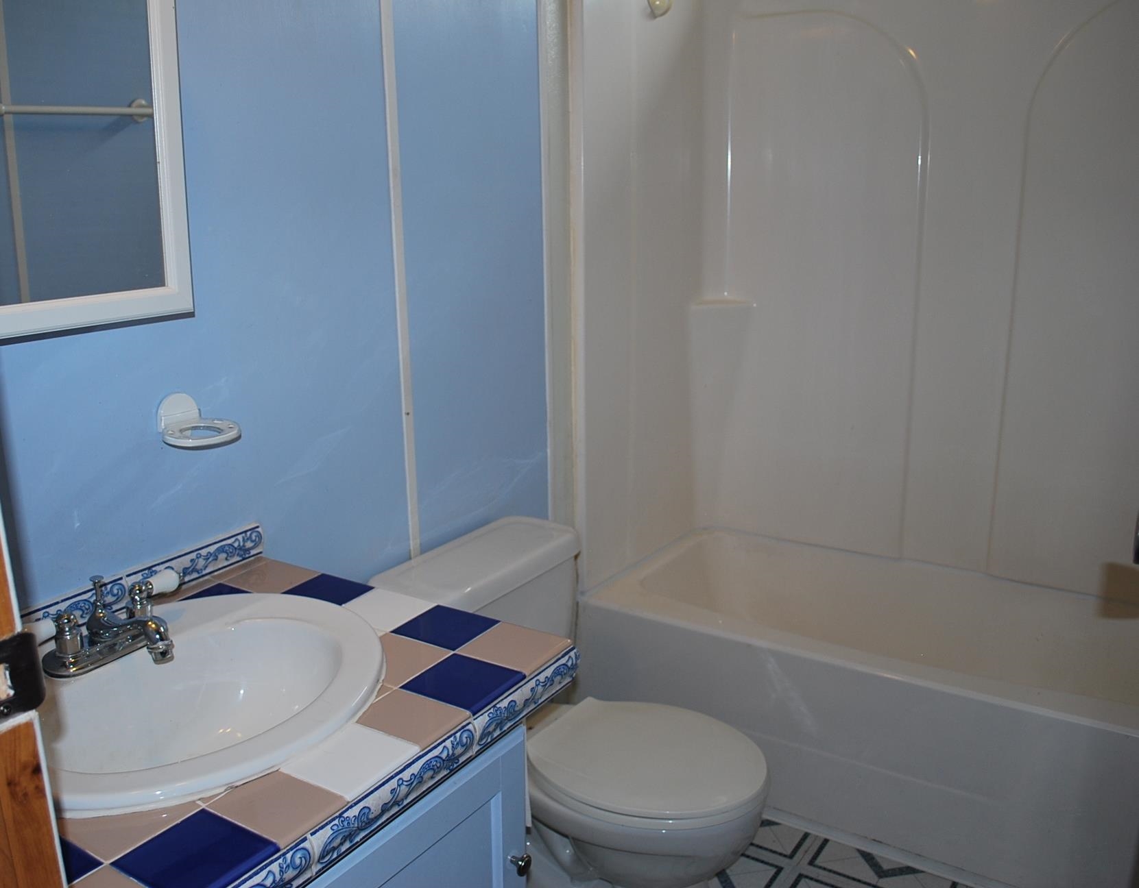 424 32 Road, Unit 168 Clifton, CO 81520 - Photo 5 of 17 a bathroom with a sink toilet and shower