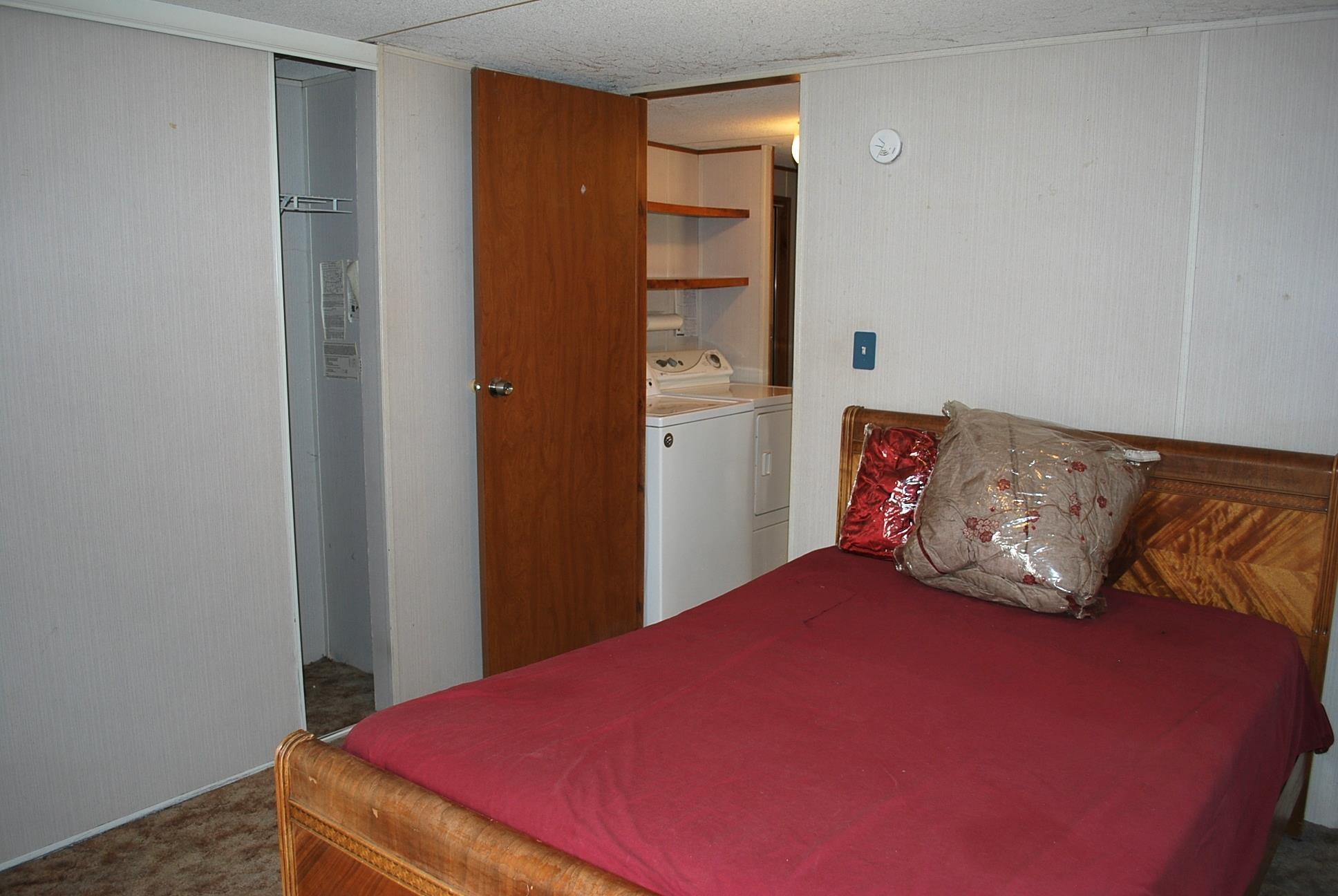 424 32 Road, Unit 168 Clifton, CO 81520 - Photo 8 of 17 a bedroom with a bed and a closet