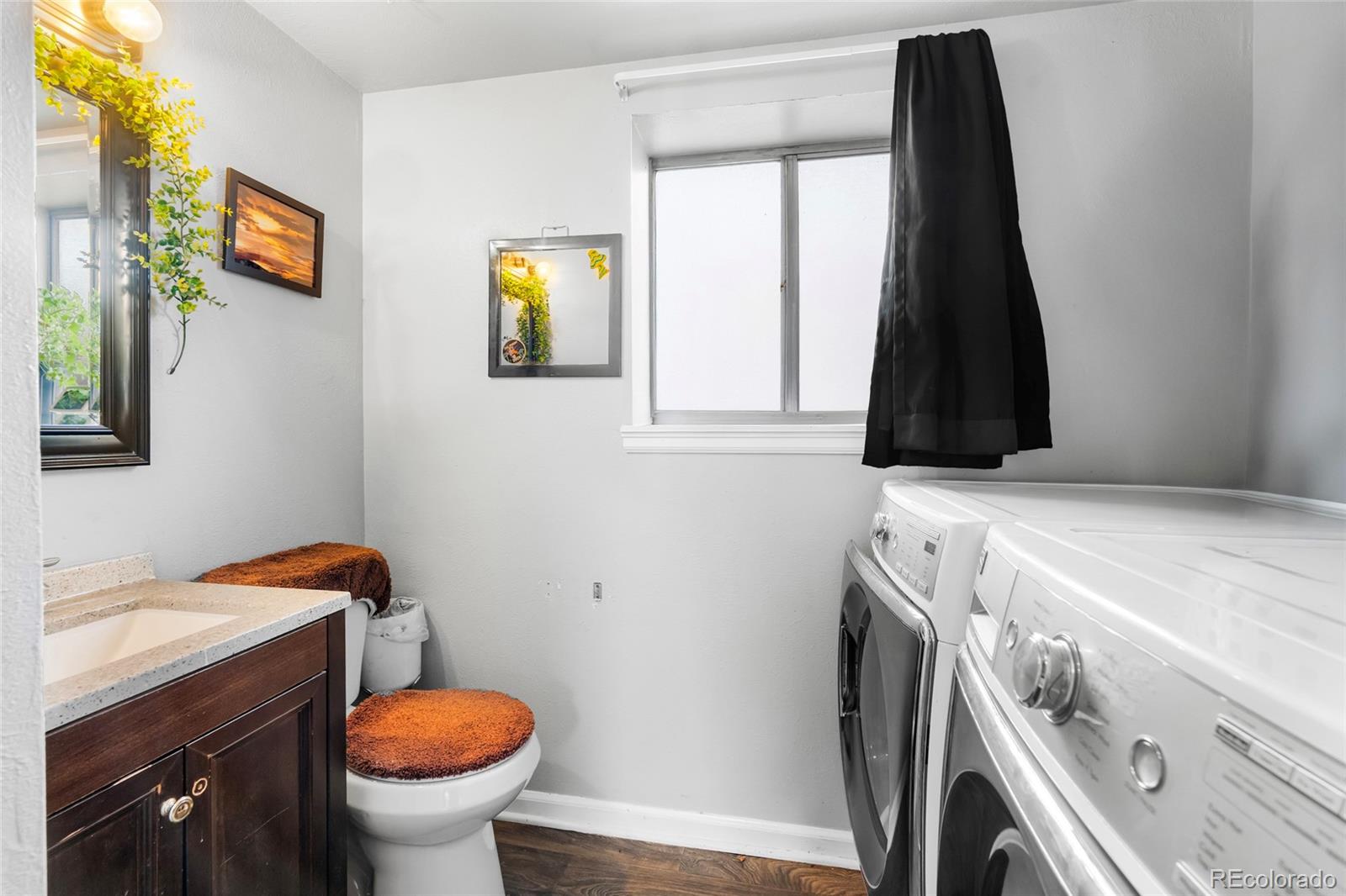 4609 Fontana Way Denver, CO 80239 - Photo 16 of 22 a utility room with dryer and washer