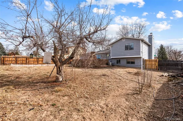 a view of a yard with an outdoor space