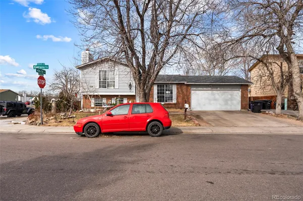 a cars parked in front of a house