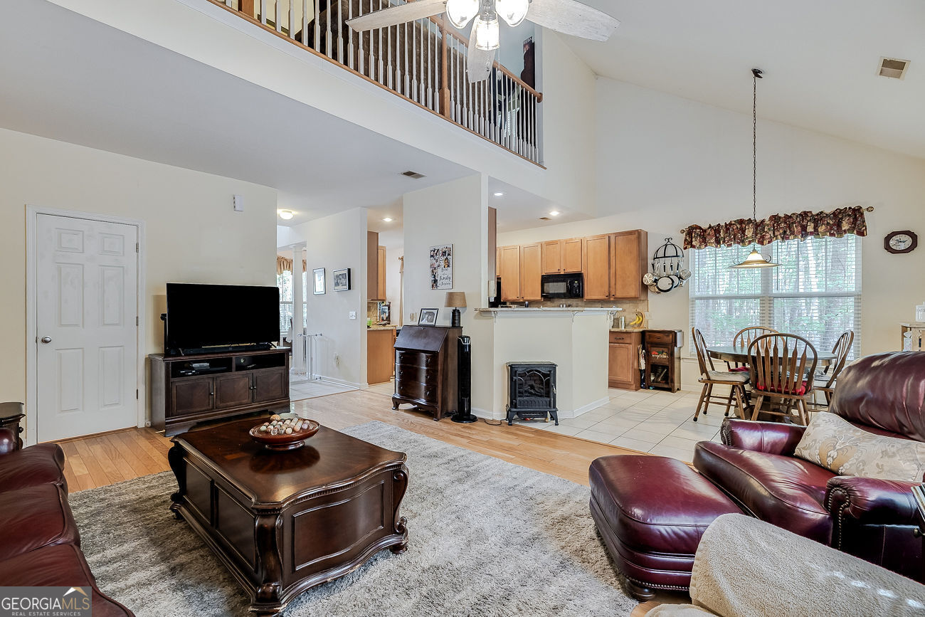 150 Royal Lane Pooler, GA 31322 - Photo 12 of 38 a living room with furniture and a flat screen tv