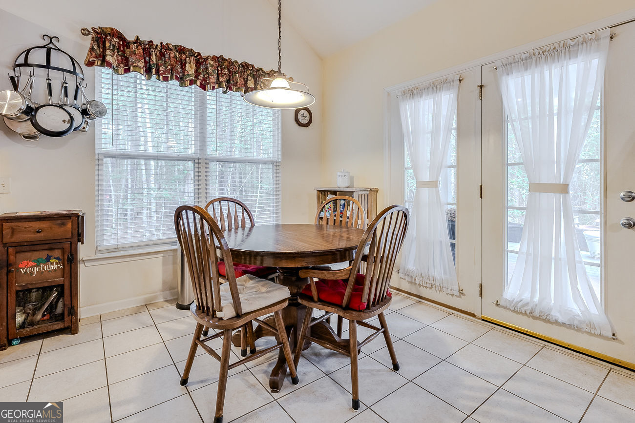 150 Royal Lane Pooler, GA 31322 - Photo 13 of 38 a view of a dining room with furniture and a chandelier