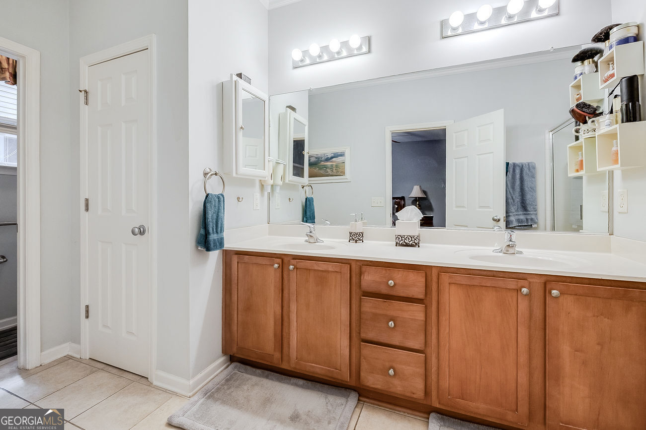 150 Royal Lane Pooler, GA 31322 - Photo 23 of 38 a spacious bathroom with double sink and a mirror