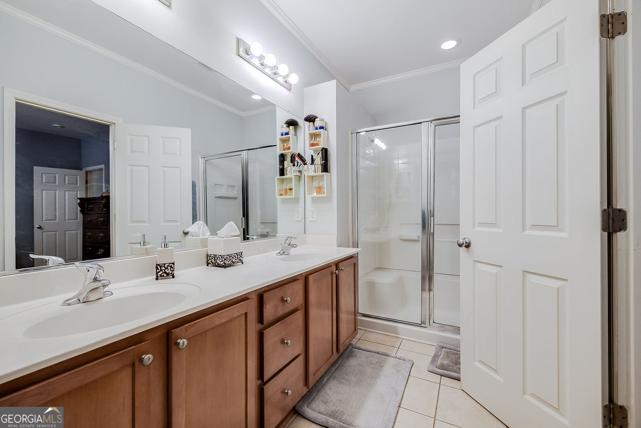 150 Royal Lane Pooler, GA 31322 - Photo 24 of 38 a bathroom with a double vanity sink mirror and double