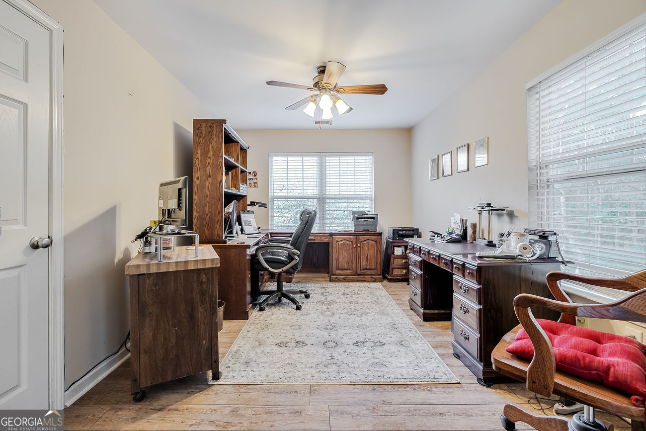 150 Royal Lane Pooler, GA 31322 - Photo 28 of 38 a view of a workspace with furniture and a window