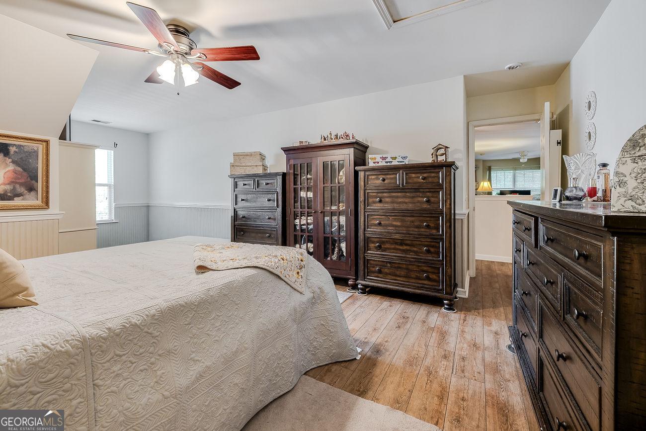 150 Royal Lane Pooler, GA 31322 - Photo 30 of 38 a bed room with a bed and a walk in closet