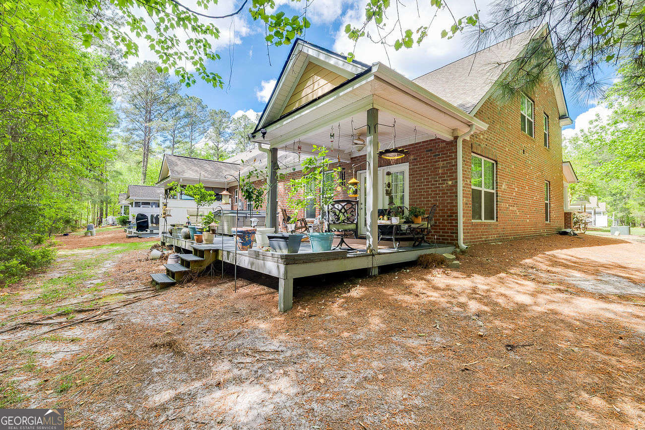 150 Royal Lane Pooler, GA 31322 - Photo 38 of 38 a view of a house with backyard porch and sitting area