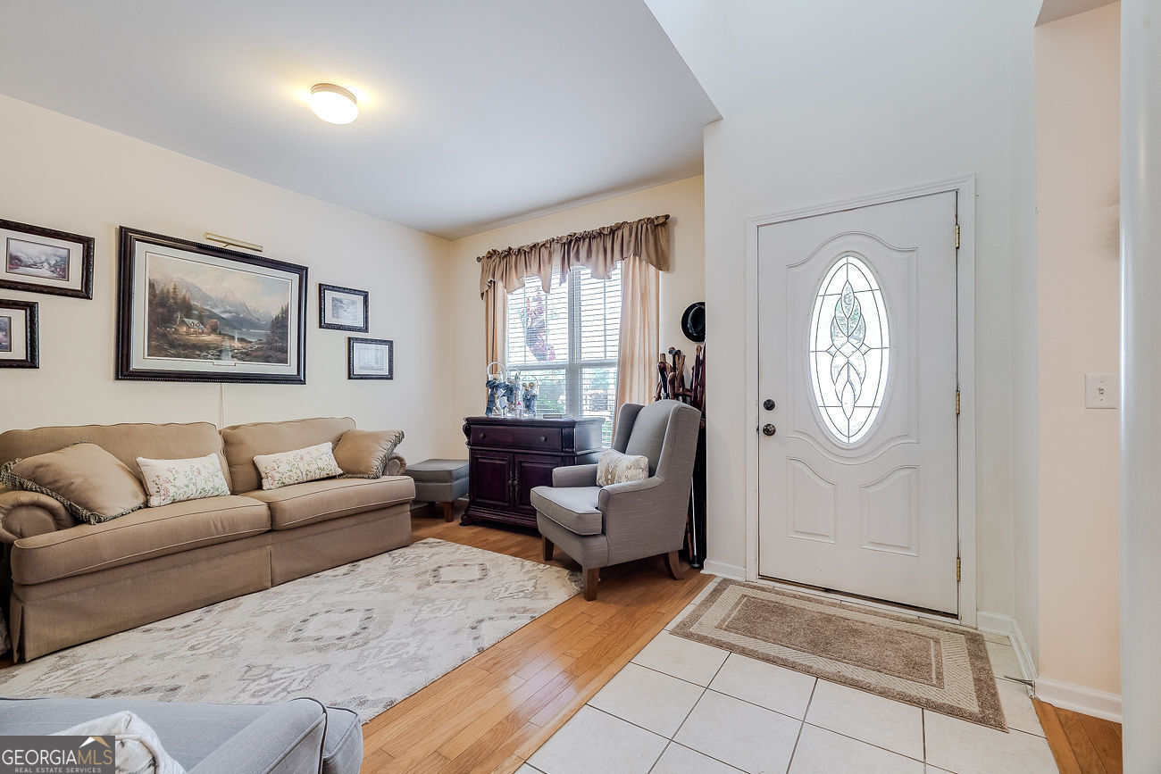 150 Royal Lane Pooler, GA 31322 - Photo 4 of 38 a living room with furniture and a window