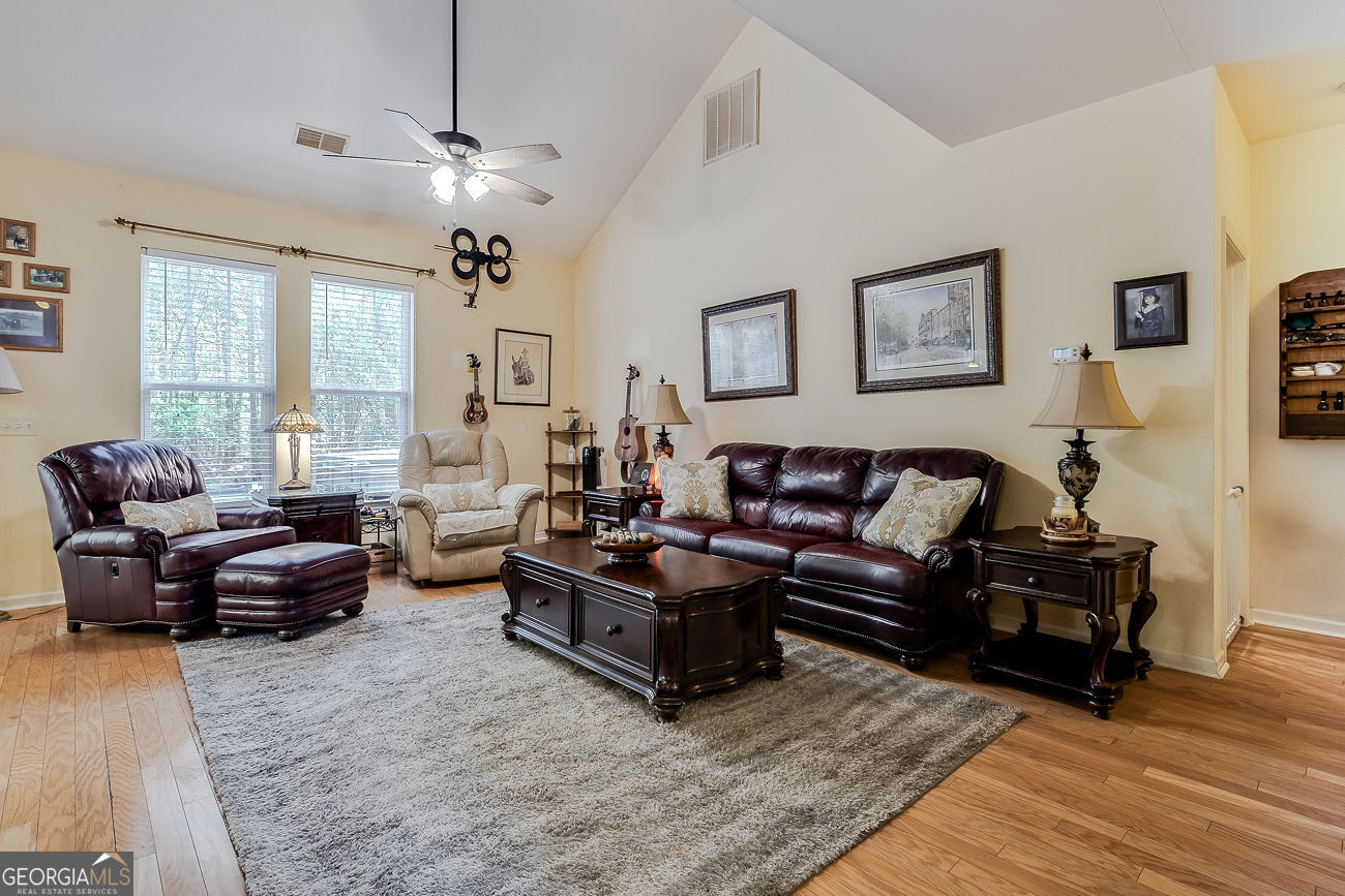 150 Royal Lane Pooler, GA 31322 - Photo 9 of 38 a living room with furniture and a large window