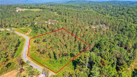 a view of a yard with an outdoor space