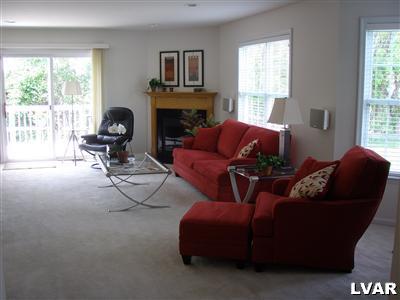 4161 Walter Road Bethlehem, PA 18020 - Photo 10 of 22 a living room with furniture and a fireplace