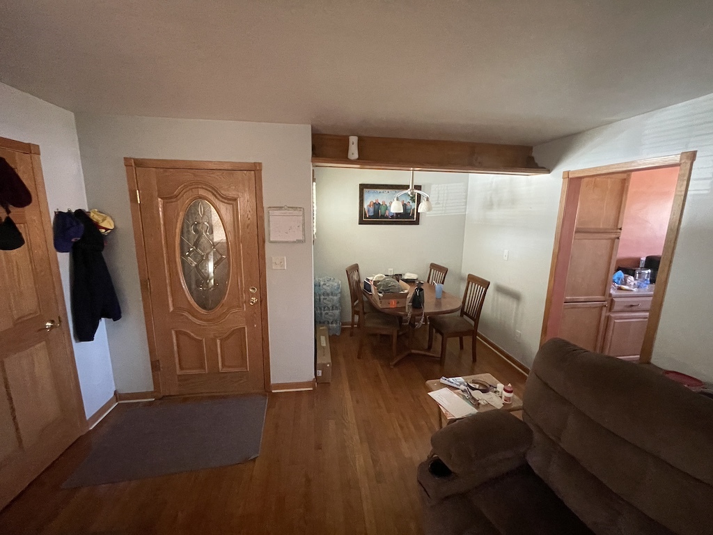 1231 Blatt Boulevard Bradley, IL 60915 - Photo 2 of 8 a living room with furniture and a window