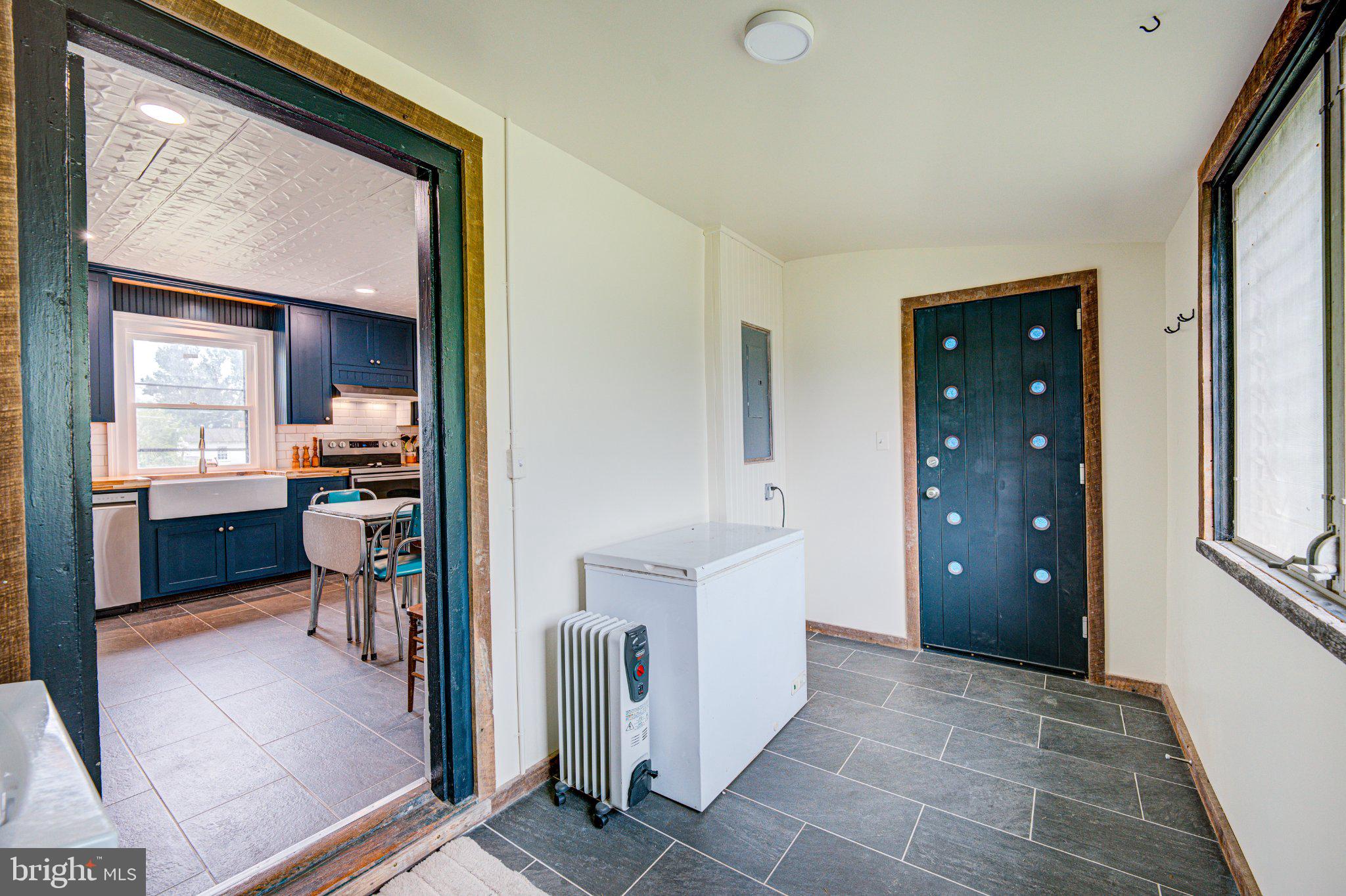 24177 Rapidan Road Mitchells, VA 22729 - Photo 11 of 43 Charming entryway with modern flair.