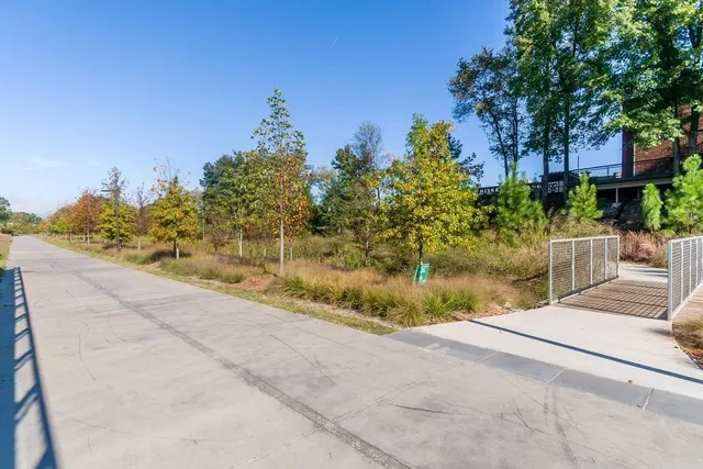 a backyard of a house with lots of green space