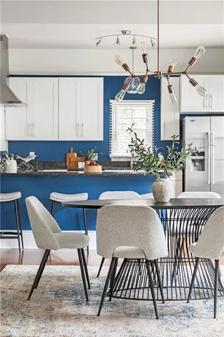 a view of a dining room with furniture