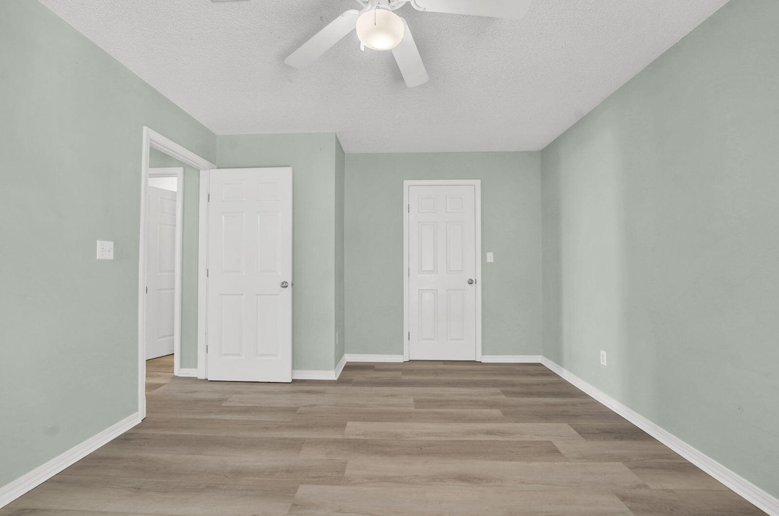 93 Beachfront Trail Santa Rosa Beach, FL 32459 - Photo 12 of 42 a view of room with window and hardwood floor