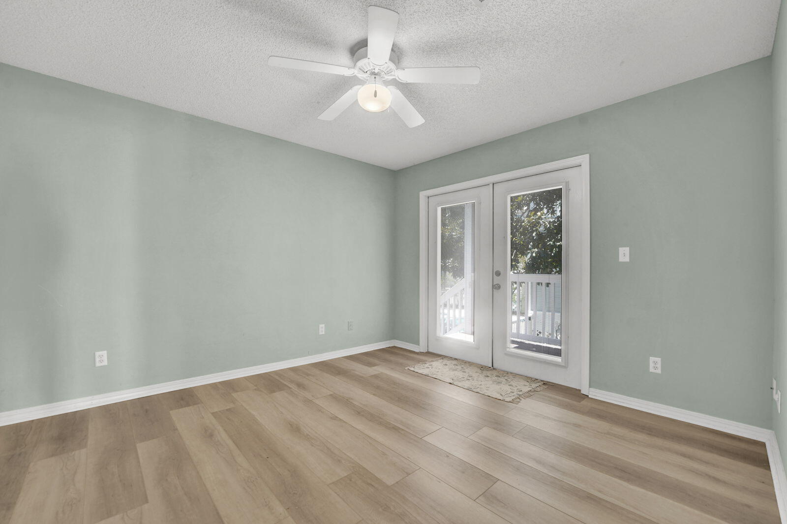 93 Beachfront Trail Santa Rosa Beach, FL 32459 - Photo 13 of 42 wooden floor in an empty room with a window