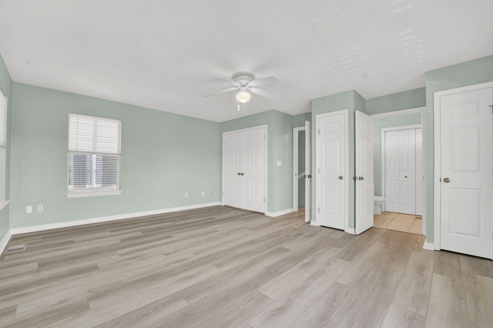 93 Beachfront Trail Santa Rosa Beach, FL 32459 - Photo 21 of 42 wooden floor in an empty room with a window