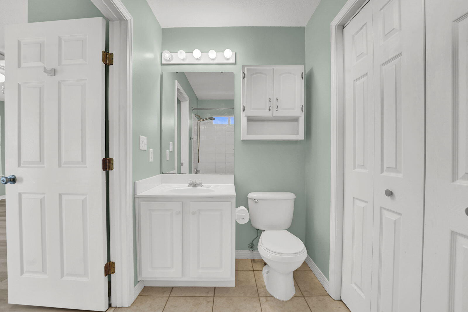 93 Beachfront Trail Santa Rosa Beach, FL 32459 - Photo 24 of 42 a bathroom with a toilet sink and mirror