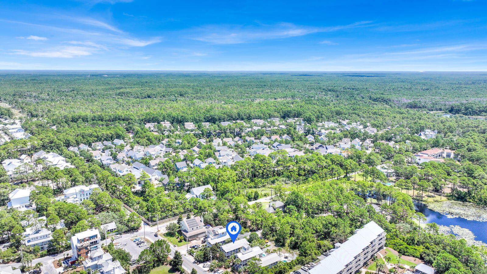 93 Beachfront Trail Santa Rosa Beach, FL 32459 - Photo 39 of 42 a view of a city with lush green forest