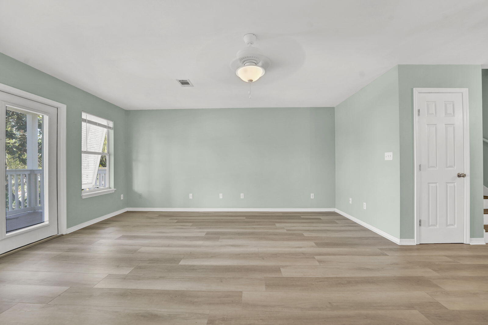 93 Beachfront Trail Santa Rosa Beach, FL 32459 - Photo 6 of 42 wooden floor in an empty room with a window