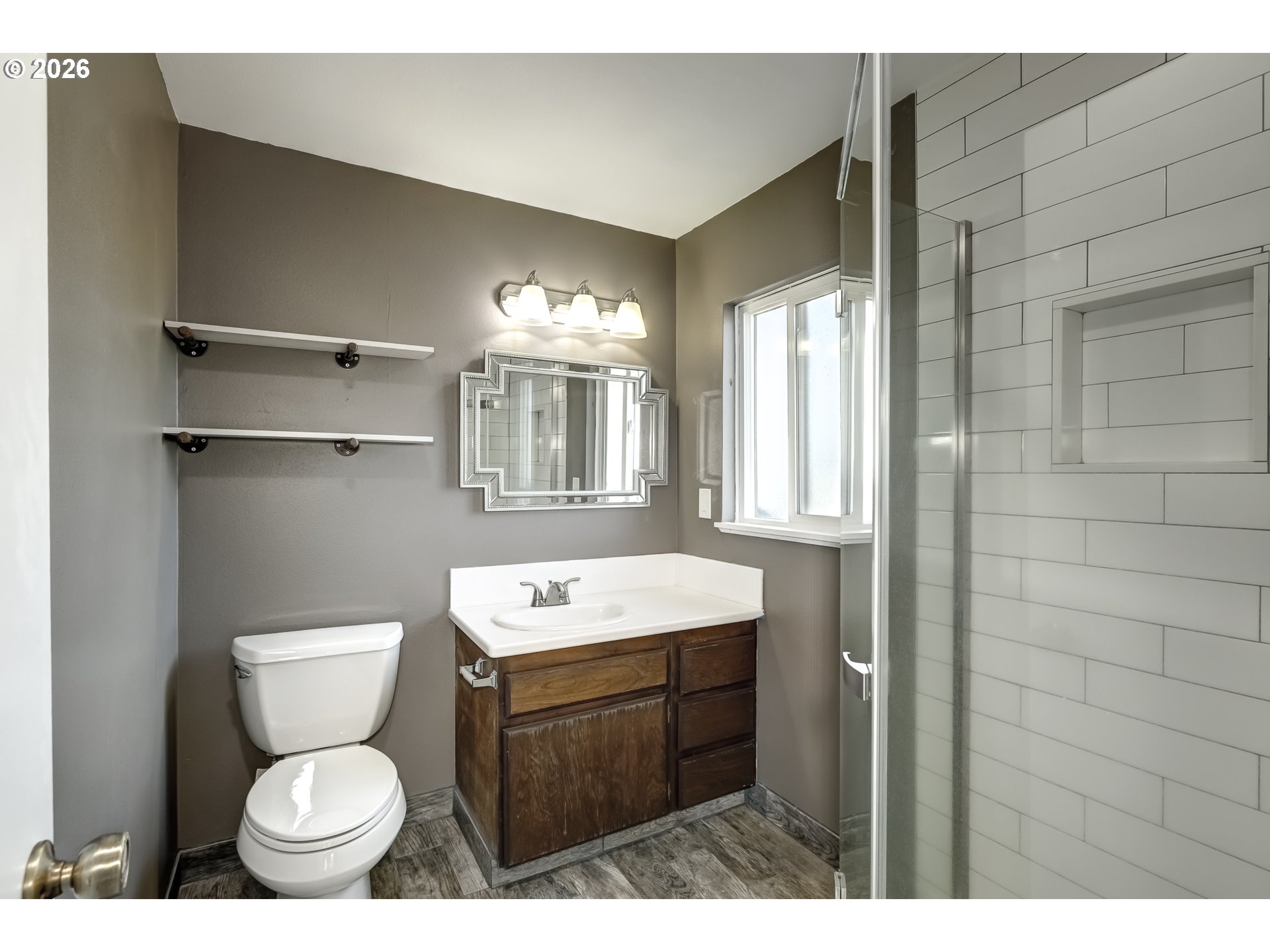 42371 Northwest Banks Road Banks, OR 97106 - Photo 15 of 42 a bathroom with a toilet sink and mirror