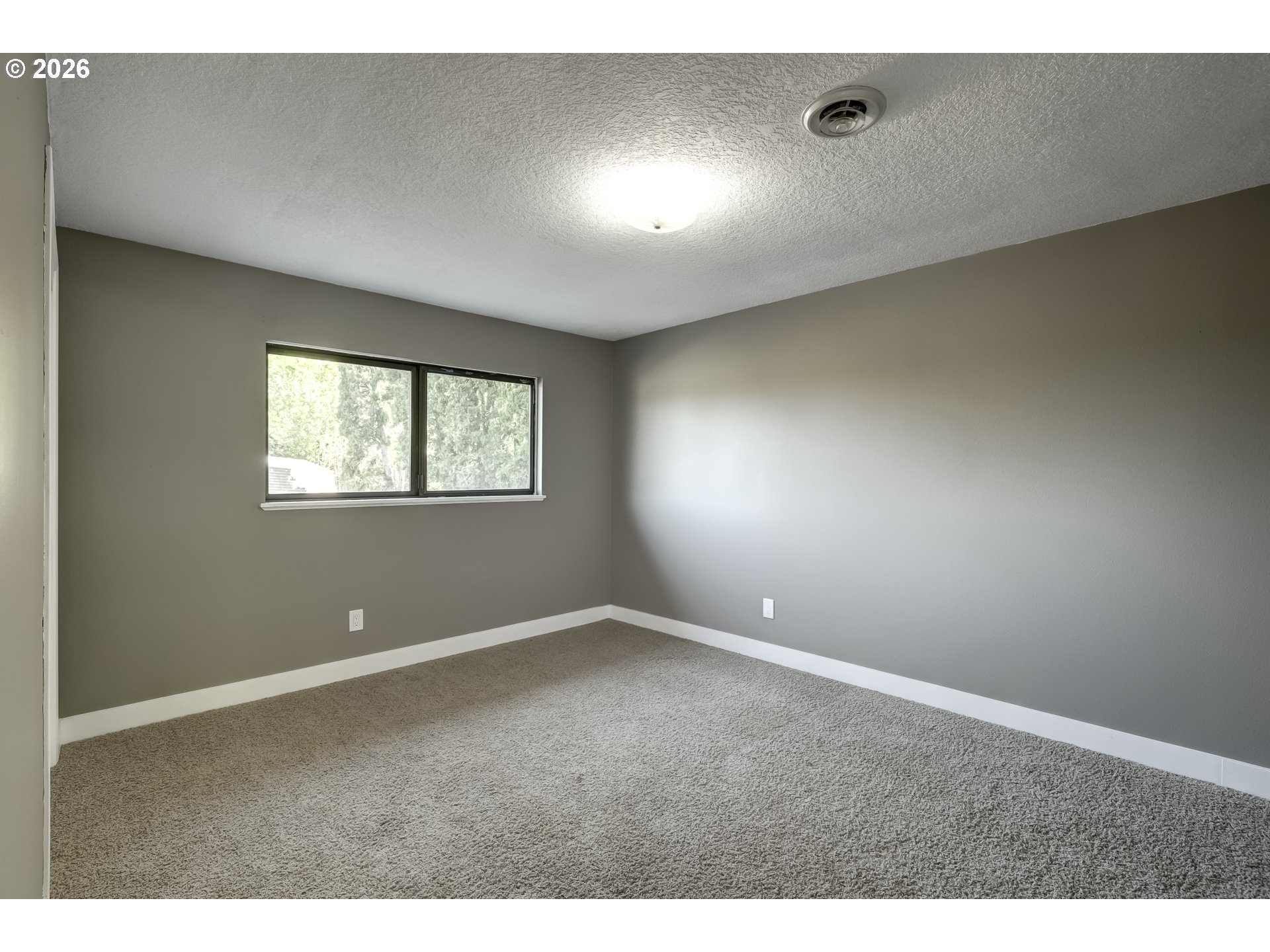 42371 Northwest Banks Road Banks, OR 97106 - Photo 18 of 42 a view of an empty room with a window