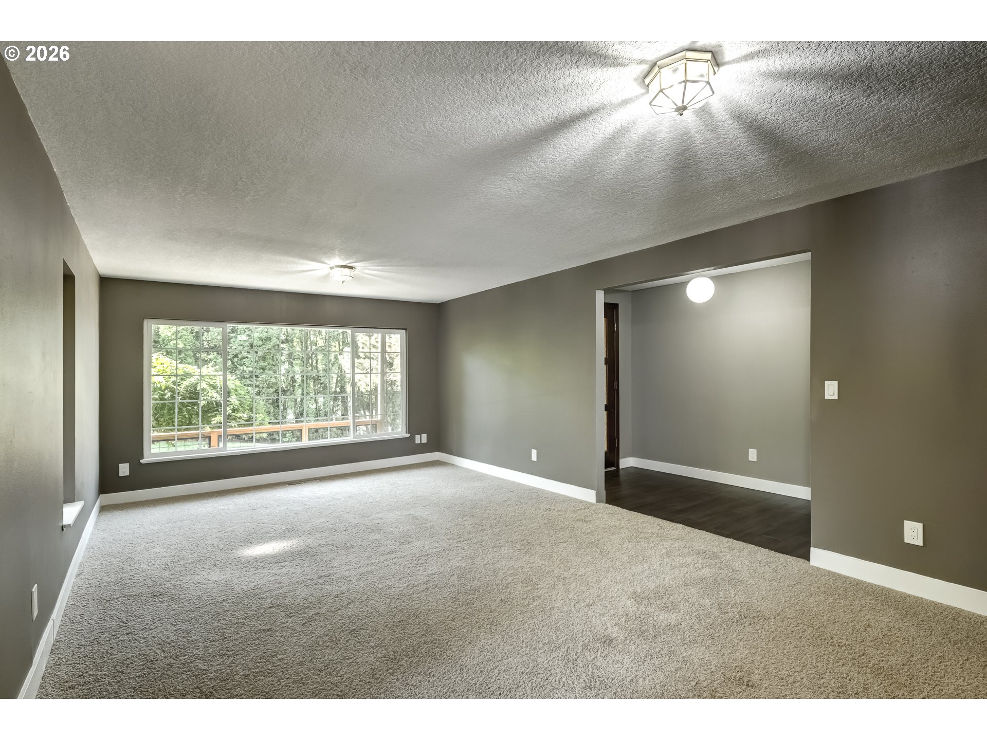 42371 Northwest Banks Road Banks, OR 97106 - Photo 28 of 42 a view of a livingroom with a ceiling fan and window