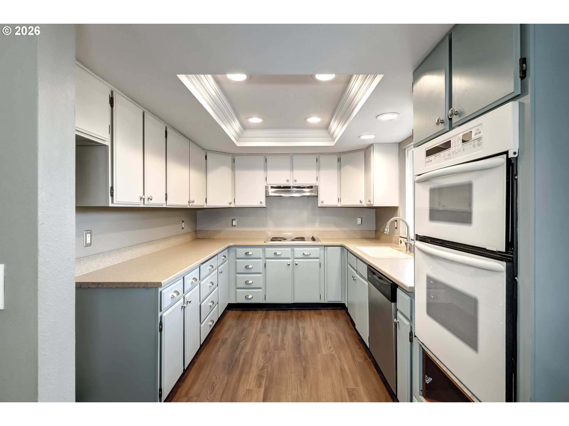 42371 Northwest Banks Road Banks, OR 97106 - Photo 4 of 42 a kitchen with cabinets and white appliances