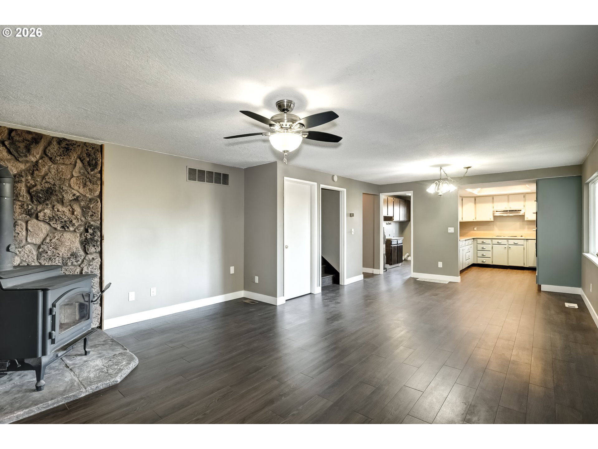 42371 Northwest Banks Road Banks, OR 97106 - Photo 9 of 42 a view of an empty room with window and wooden floor